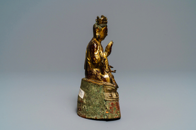 A Burmese lacquered and gilt bronze figure of Buddha, 17/18th C.