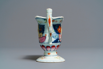 A Chinese famille rose 'Tobacco leaf' helmet-shaped jug, Qianlong