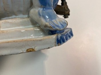 Une fontaine de table figurant Bacchus sur un tonneau en fa&iuml;ence polychrome de Bruxelles, 18&egrave;me