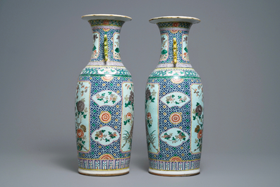 A pair of Chinese famille rose vases with birds among flowers, 19th C.