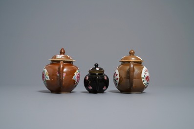 Three Chinese famille rose capucin- and black-ground teapots, Yongzheng/Qianlong