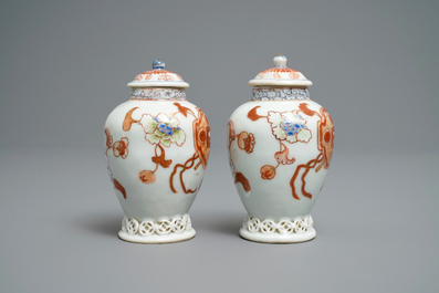 A pair of Chinese iron red and gilt tea caddies and covers, Yongzheng