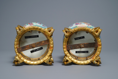 A pair of Chinese Canton famille rose vases with gilt bronze mounts, 19th C.