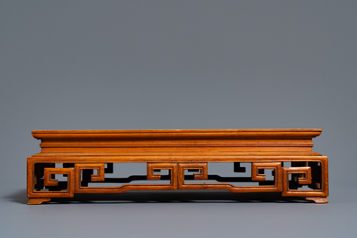 Two Chinese carved wooden trays and a stand, 18/19th C.