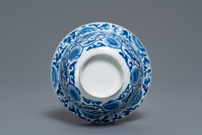 A Chinese blue and white bowl with floral scrolls, Kangxi