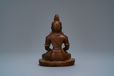 A Chinese bronze figure of Buddha Amithayus, 17/18th C.