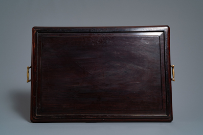 Two Chinese carved wooden trays and a stand, 18/19th C.