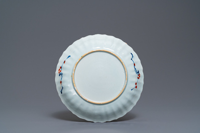 A Chinese famille verte 'Provinces' dish with the arms of England, Kangxi/Yongzheng