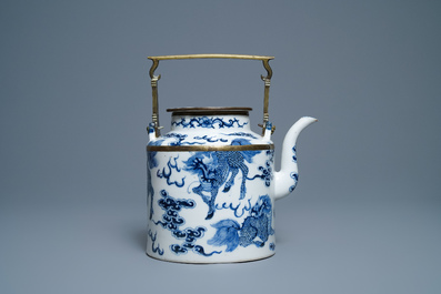 A large Chinese blue and white Vietnamese market 'Bleu de Hue' teapot with qilins, 19th C.