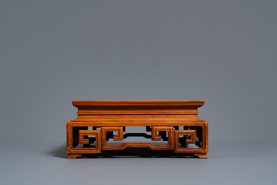 Two Chinese carved wooden trays and a stand, 18/19th C.