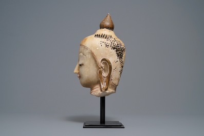 A gilt-lacquered alabaster head of Buddha, Burma, 19th C.