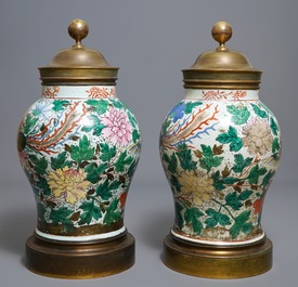 A pair of large bronze-mounted Chinese famille rose vases, 19th C.