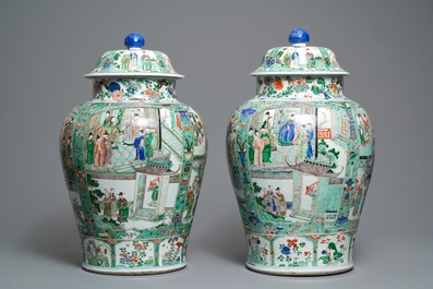 A pair of large Chinese famille verte vases and covers, Kangxi