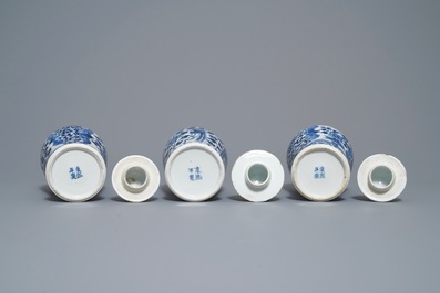 A Chinese blue and white five-piece garniture with peacocks, Kangxi mark, 19th C.