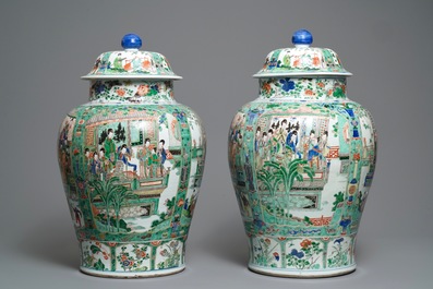 A pair of large Chinese famille verte vases and covers, Kangxi