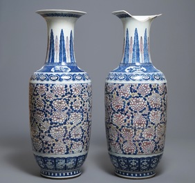 A pair of large Chinese blue, white and underglaze red vases, 19th C.