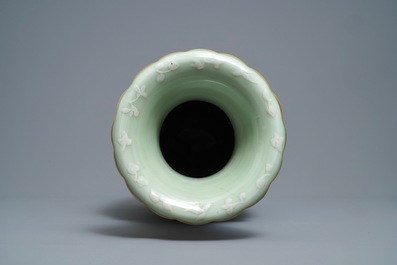 A Chinese brown- and celadon-ground famille rose vase, 19th C.