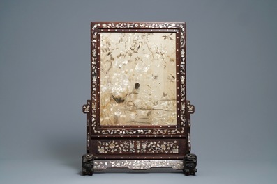 A Chinese mother-of-pearl-inlaid wooden screen with silk embroidery, 19th C.