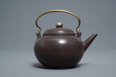 A Chinese Bencharong Thai market polished Yixing stoneware teapot, 19th C.