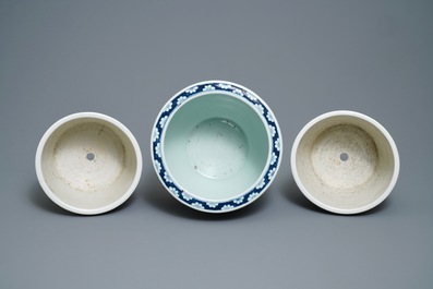 A pair of Chinese famille rose jardini&egrave;res and a blue and white example, 19th C.