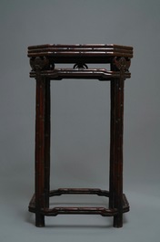A Chinese huali wooden stand with famille rose plaque, Jiaqing