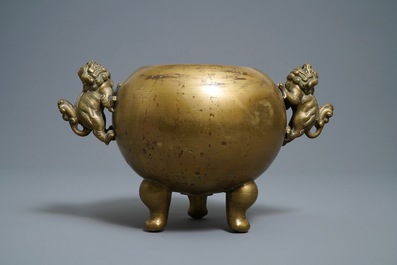 A large Chinese bronze tripod censer on stand, 19th C.