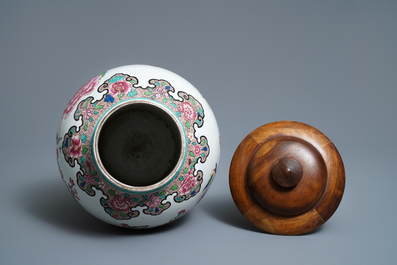 A Chinese famille rose vase, a brush pot and a famille verte bowl, 19th C.