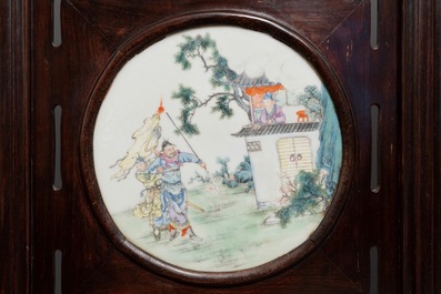 A Chinese wooden room divider with famille rose 'Romance of the Western Chamber' plaques, Republic