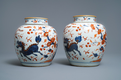 A pair of Chinese Imari-style 'qilin and phoenix' jars and covers, Kangxi