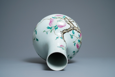 A Chinese famille rose 'peaches' vase, Qianlong mark, 19th C.