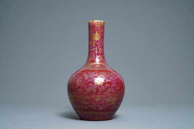 A Chinese gilt-decorated flamb&eacute;-glazed bottle vase, 19th C.