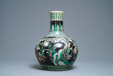 A Chinese famille verte black-ground 'war scene' vase, 19th C.