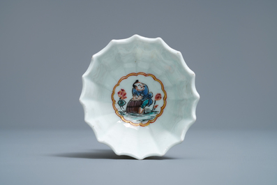 A Chinese famille rose cup and saucer with fishermen, Yongzheng