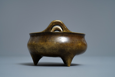 A Chinese bronze tripod censer, Xuande mark, 18/19th C.