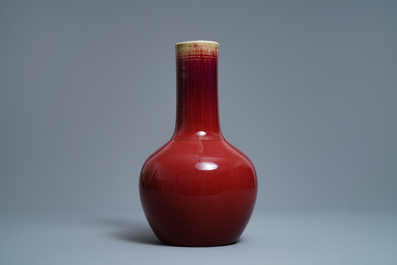 A Chinese monochrome sang-de-boeuf bottle vase, 19th C.