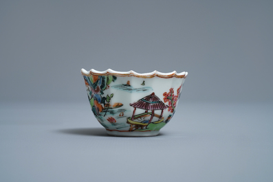 A Chinese famille rose cup and saucer with fishermen, Yongzheng