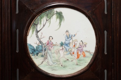 A Chinese wooden room divider with famille rose 'Romance of the Western Chamber' plaques, Republic