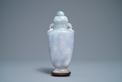 A Chinese jade 'immortals' vase and cover, 19th C.