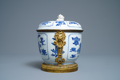 A Chinese blue and white bowl and cover with gilt bronze mounts, Kangxi