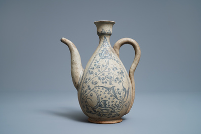 An Annamese blue and white jug with fish and lotus scrolls, Vietnam, 15/16th C.