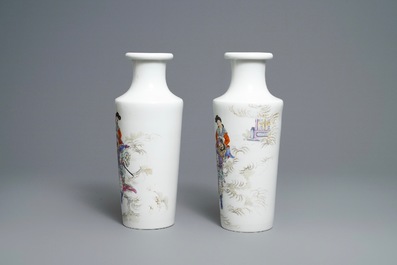 A pair of Chinese famille rose rouleau vases, four-character mark, 20th C.