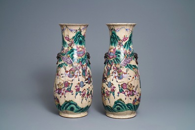 A pair of Chinese Nanking famille rose vases with warriors, 19th C.