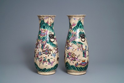 A pair of Chinese Nanking famille rose vases with warriors, 19th C.