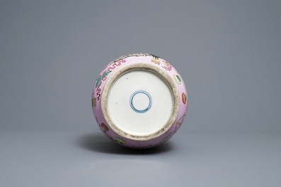 A Chinese famille rose pink-ground rouleau vase, 19th C.