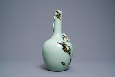 Een Chinese celadon vaas met koperrood decor, Qianlong merk en periode