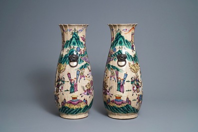 A pair of Chinese Nanking famille rose vases with warriors, 19th C.