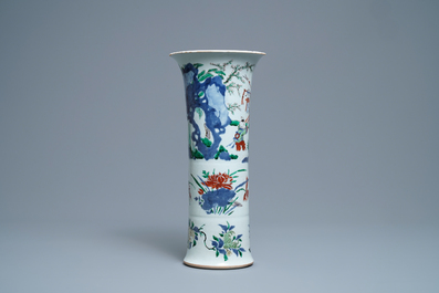 A Chinese wucai gu vase with figures in a garden, Shunzhi