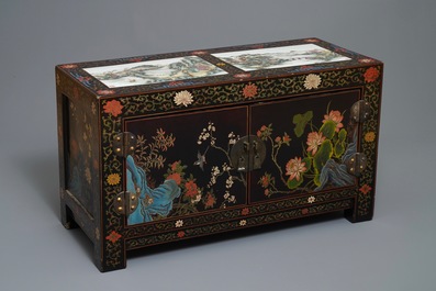 Two Chinese famille rose landscape plaques in a lacquered chest, marked Wang Yeting, 19/20th C.