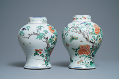 A pair of Chinese famille verte vases with birds and insects, Kangxi