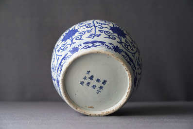 A Chinese blue and white 'lotus scroll' jar, dated 1587, Wanli mark and of the period